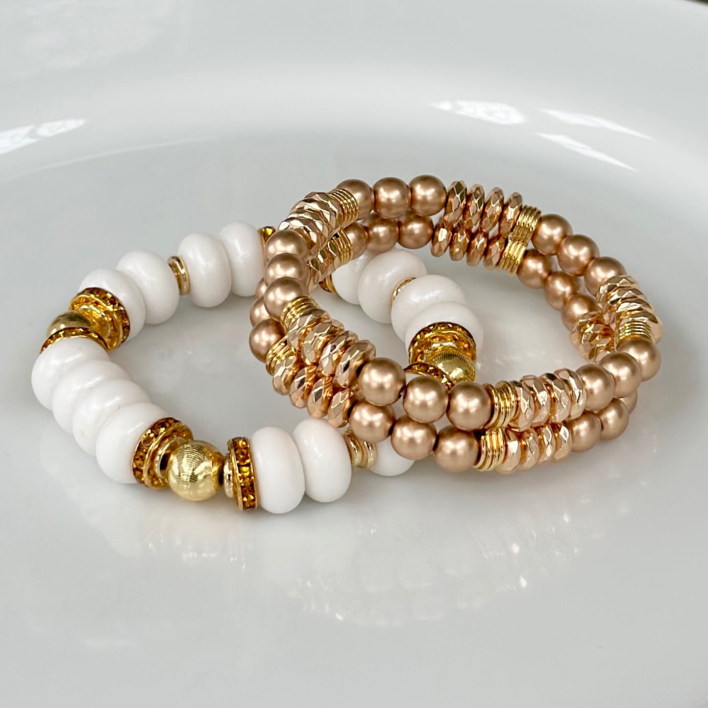 WHITE SPIRAL BANGLE WITH AMBER CZ ACCENTS