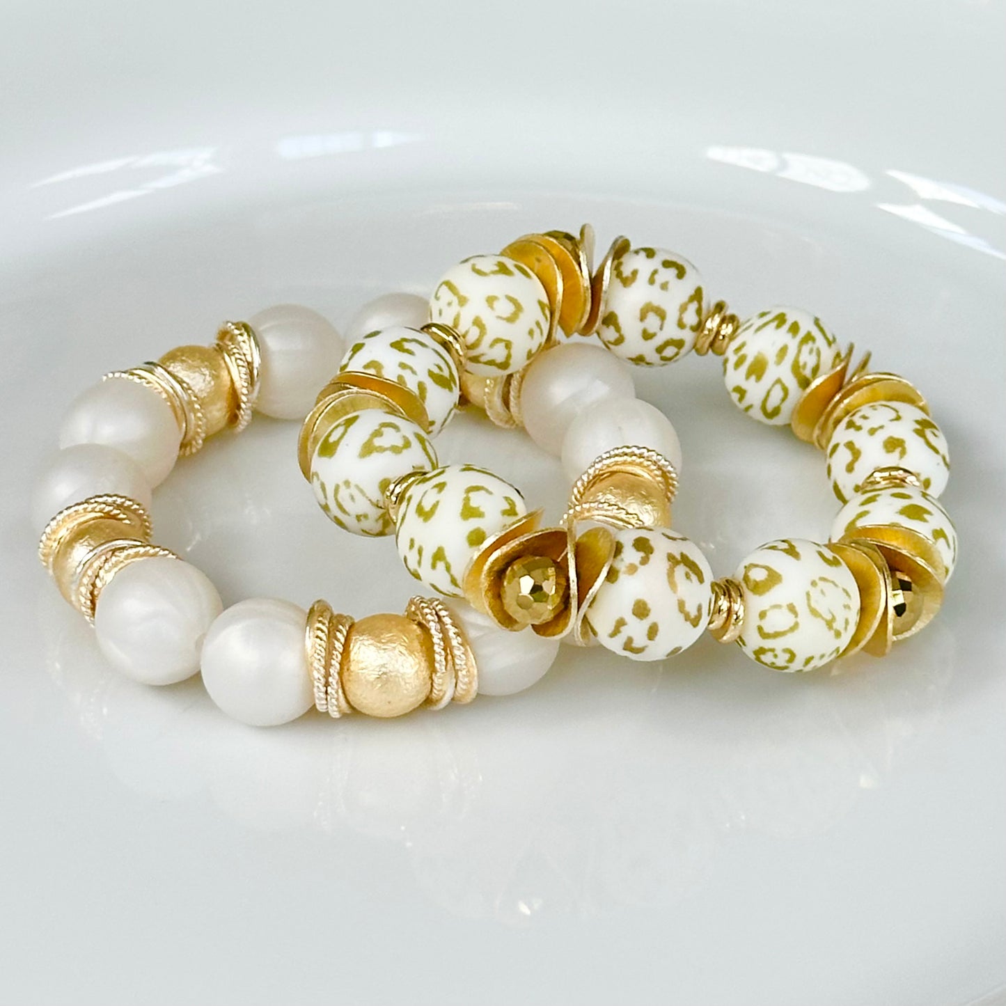 GOLD AND WHITE CHEETAH BANGLE WITH GOLD WAVY DISC AND CRYSTAL ACCENTS