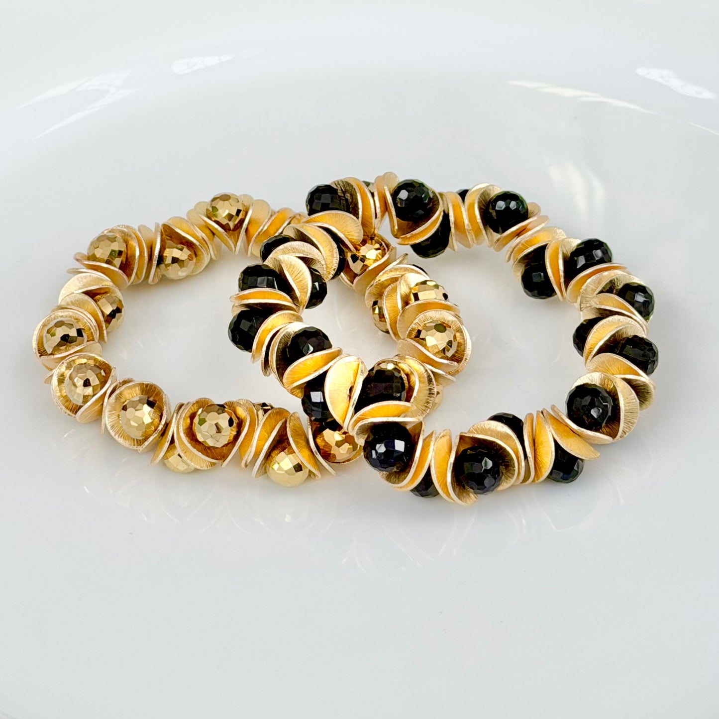 GOLD WAVY DISC AND GOLD FACETED BRIOLETTE BANGLE