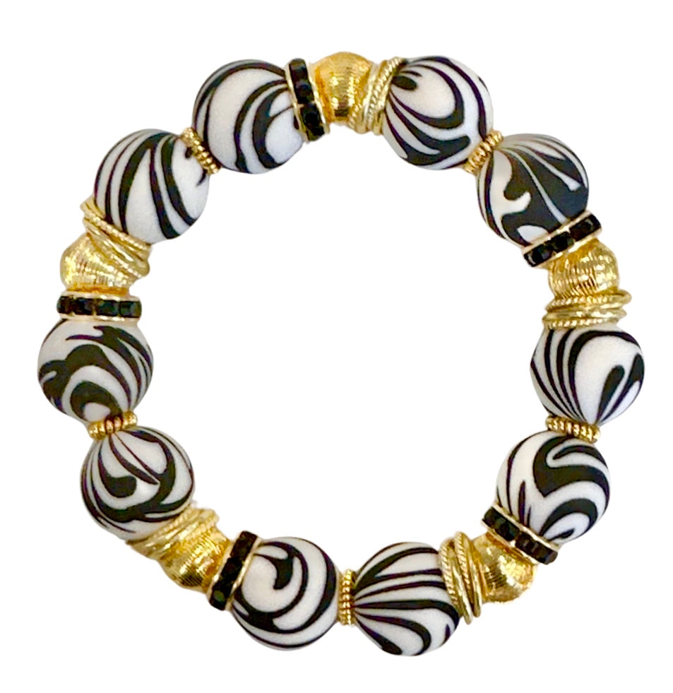 BLACK AND WHITE ZEBRA BANGLE WITH GOLD ACCENTS