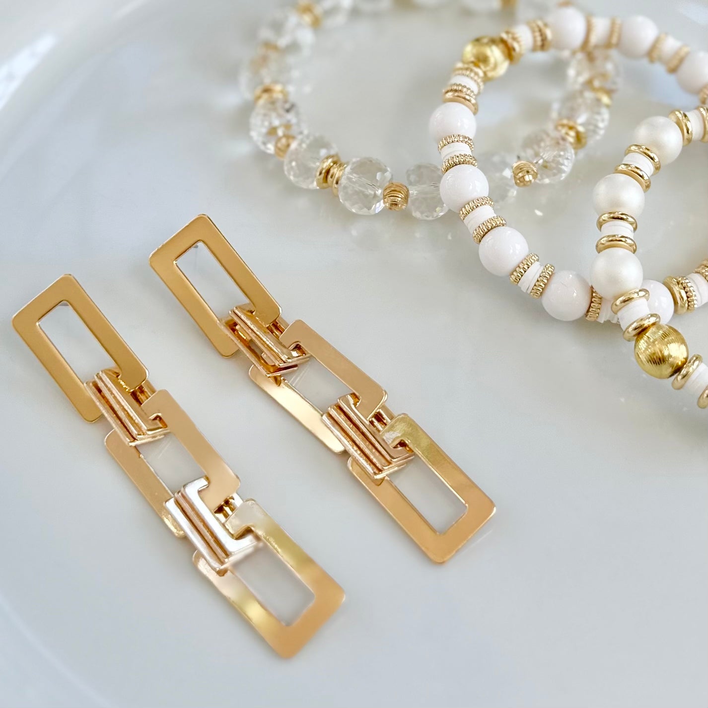 FACETED LUCITE AND GOLD BANGLE