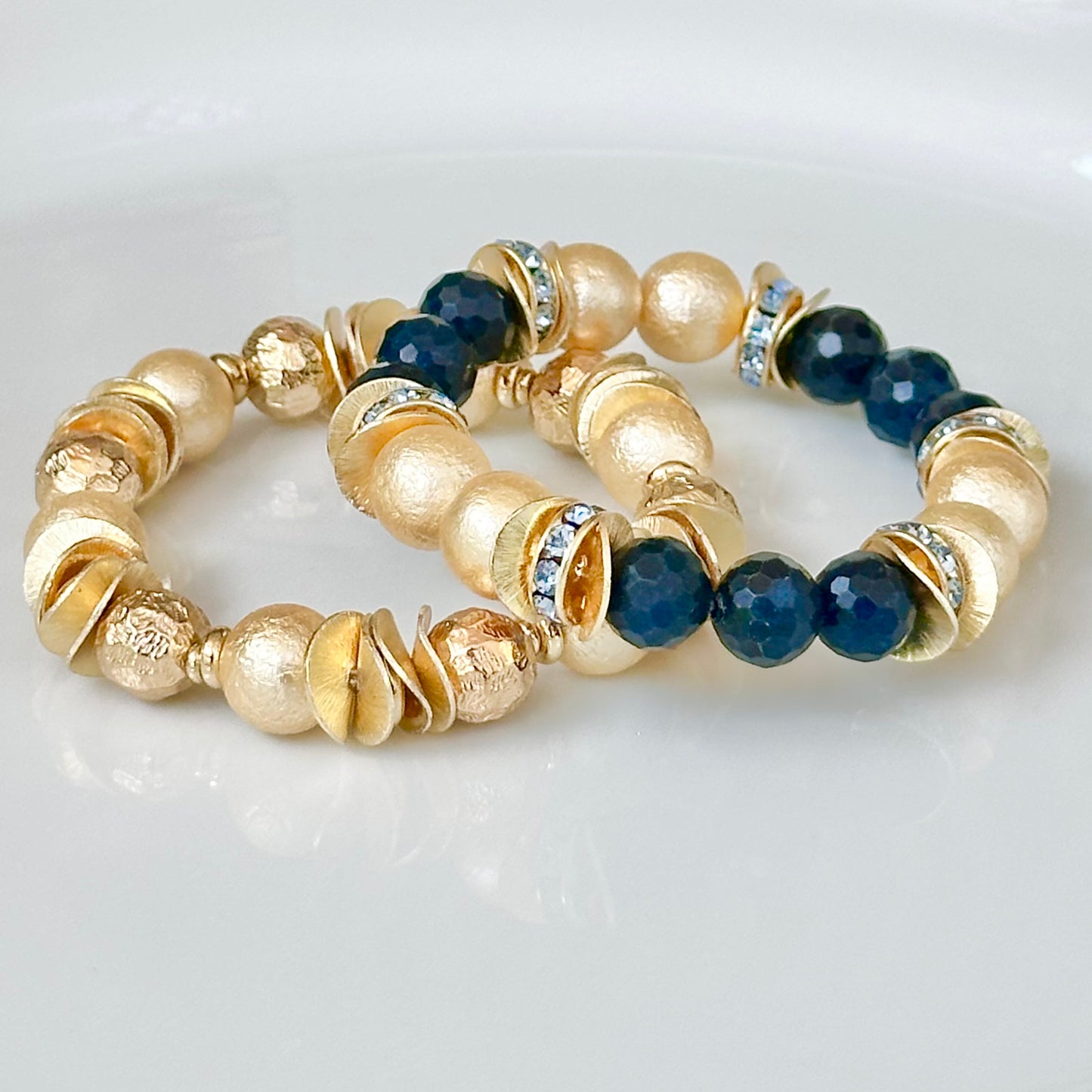 NAVY BLUE FACETED GEMSTONE, GOLD WAVY DISC BANGLE WITH GOLD AND CRYSTAL ACCENTS