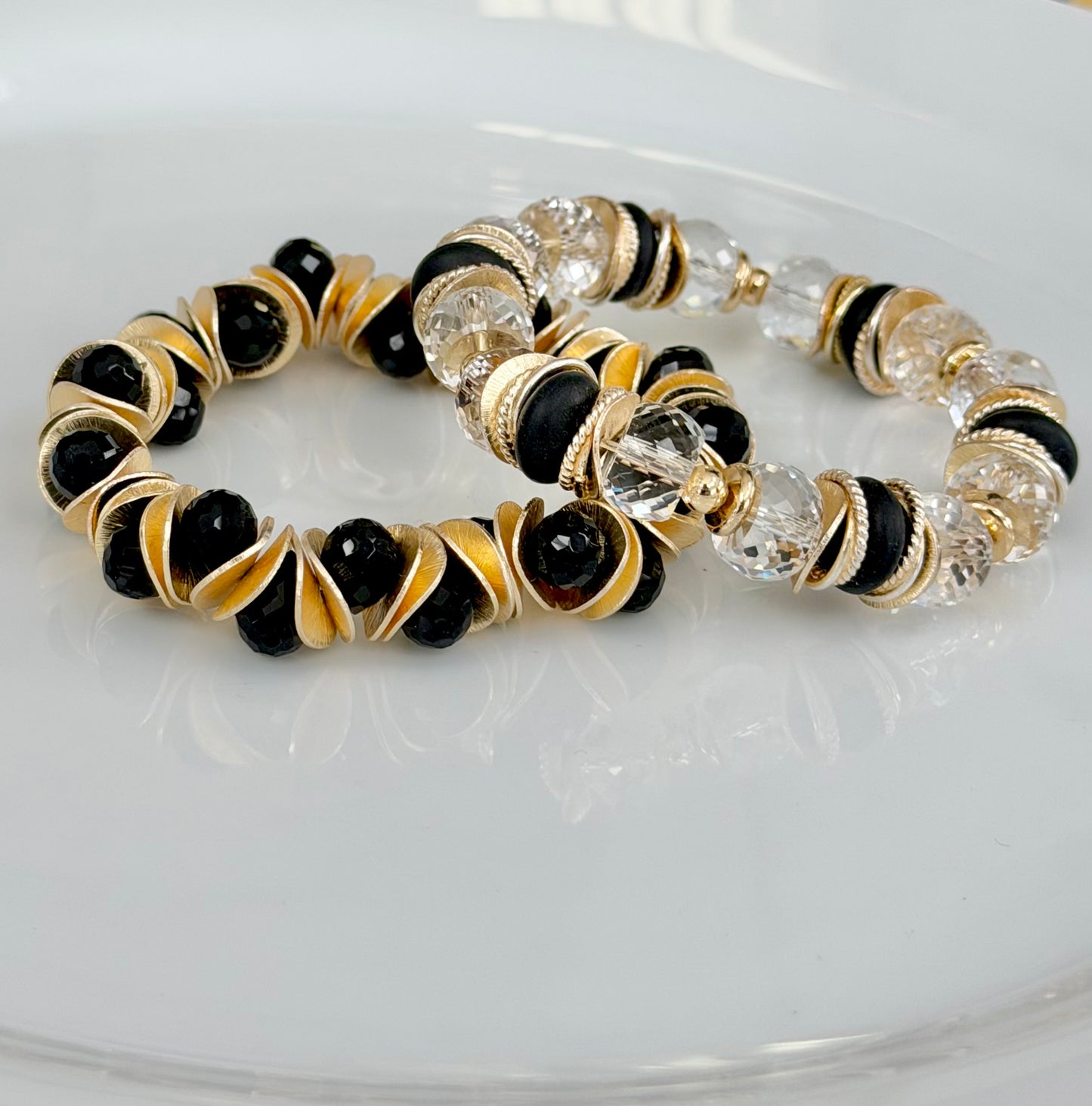 GOLD WAVY DISC AND BLACK FACETED BRIOLETTE BANGLE
