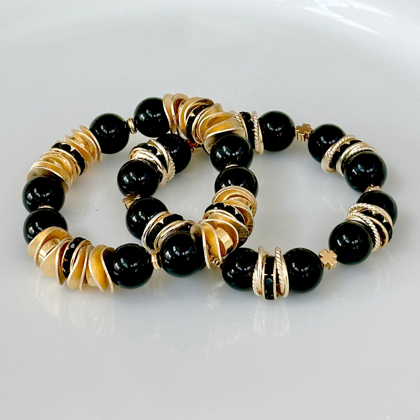 BLACK ONYX GEMSTONE BANGLE WITH GOLD WAVY DISC SND CRYSTAL ACCENTS