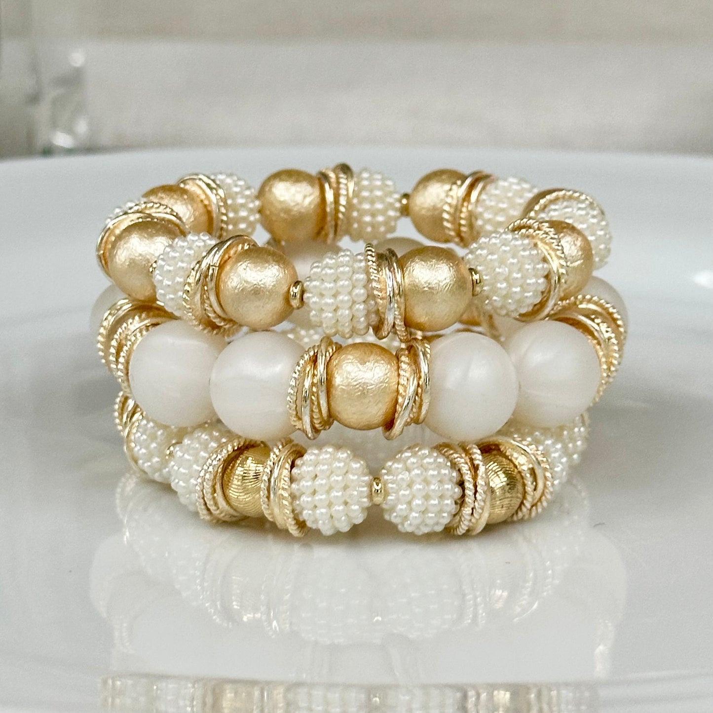 PEARLIZED IVORY BEADING BANGLE WITH SHELL PEARL AND GOLD ACCENTS