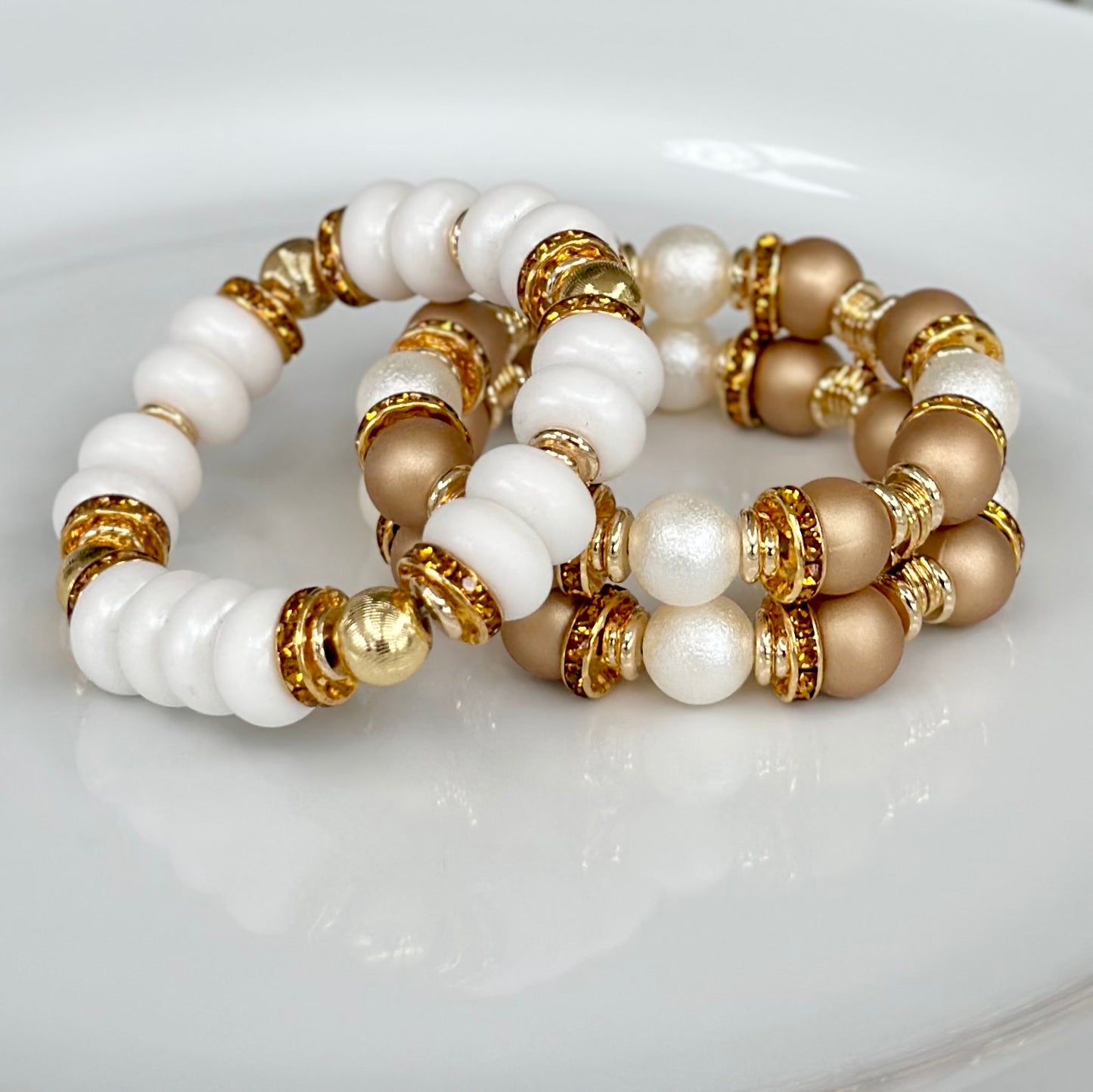 WHITE SPIRAL BANGLE WITH AMBER CZ ACCENTS