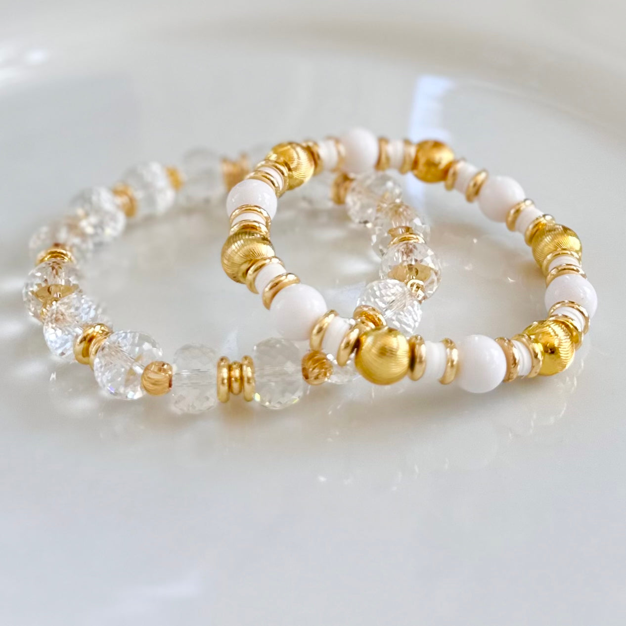 FACETED LUCITE AND GOLD BANGLE