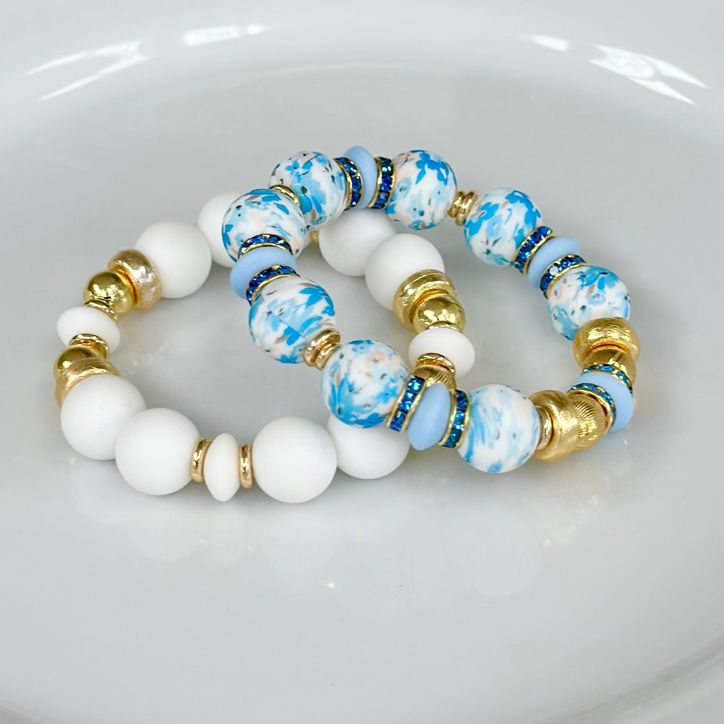 BLUE FLORAL BANGLE WITH BLUE CZ ACCENTS