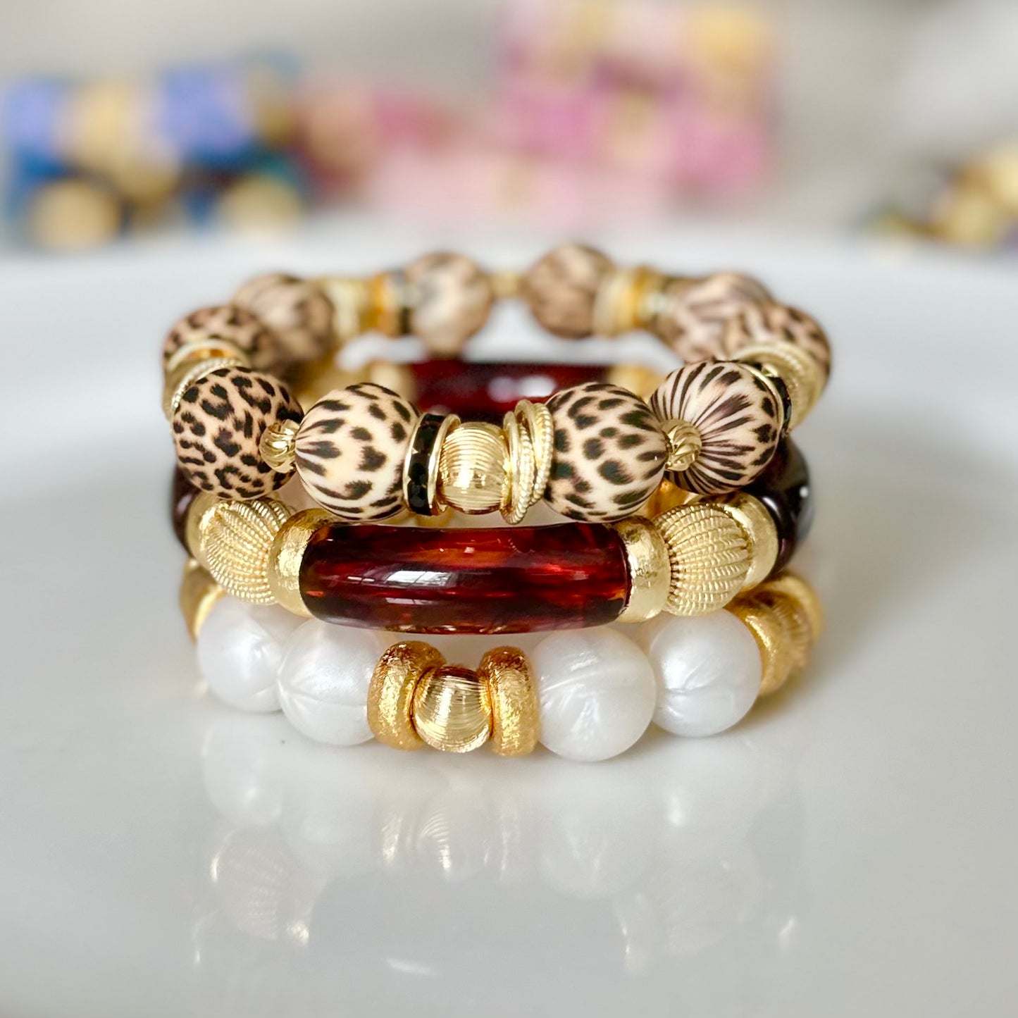 TAN AND BLACK CHEETAH PATTERN BANGLE WITH GOLD ACCENTS