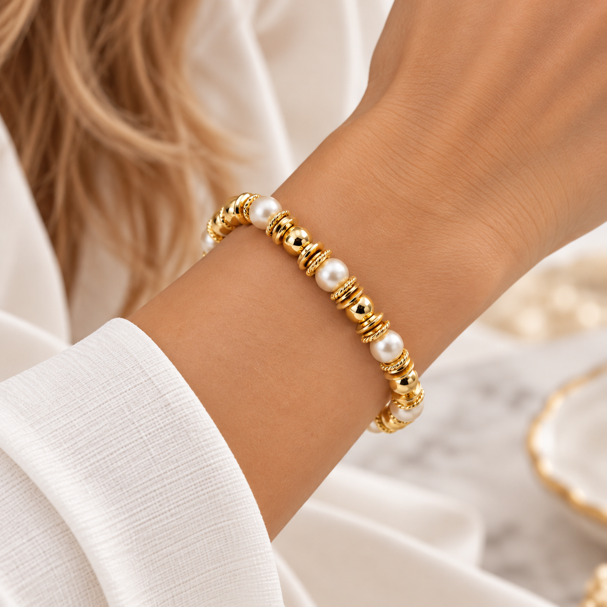 THE ARABELLA GOLD AND PEARL BANGLE