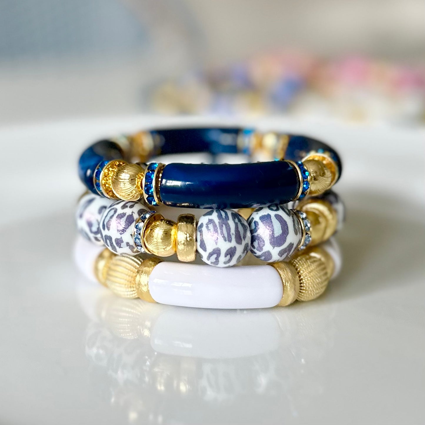 NAVY BLUE AND GOLD LINK BRACELET WITH CZ ACCENTS