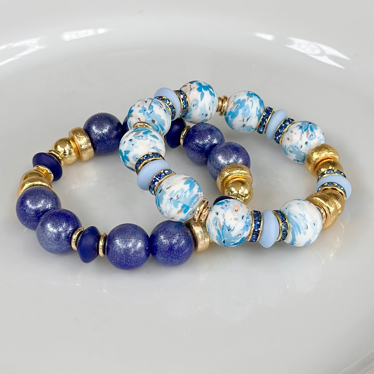 BLUE FLORAL BANGLE WITH BLUE CZ ACCENTS