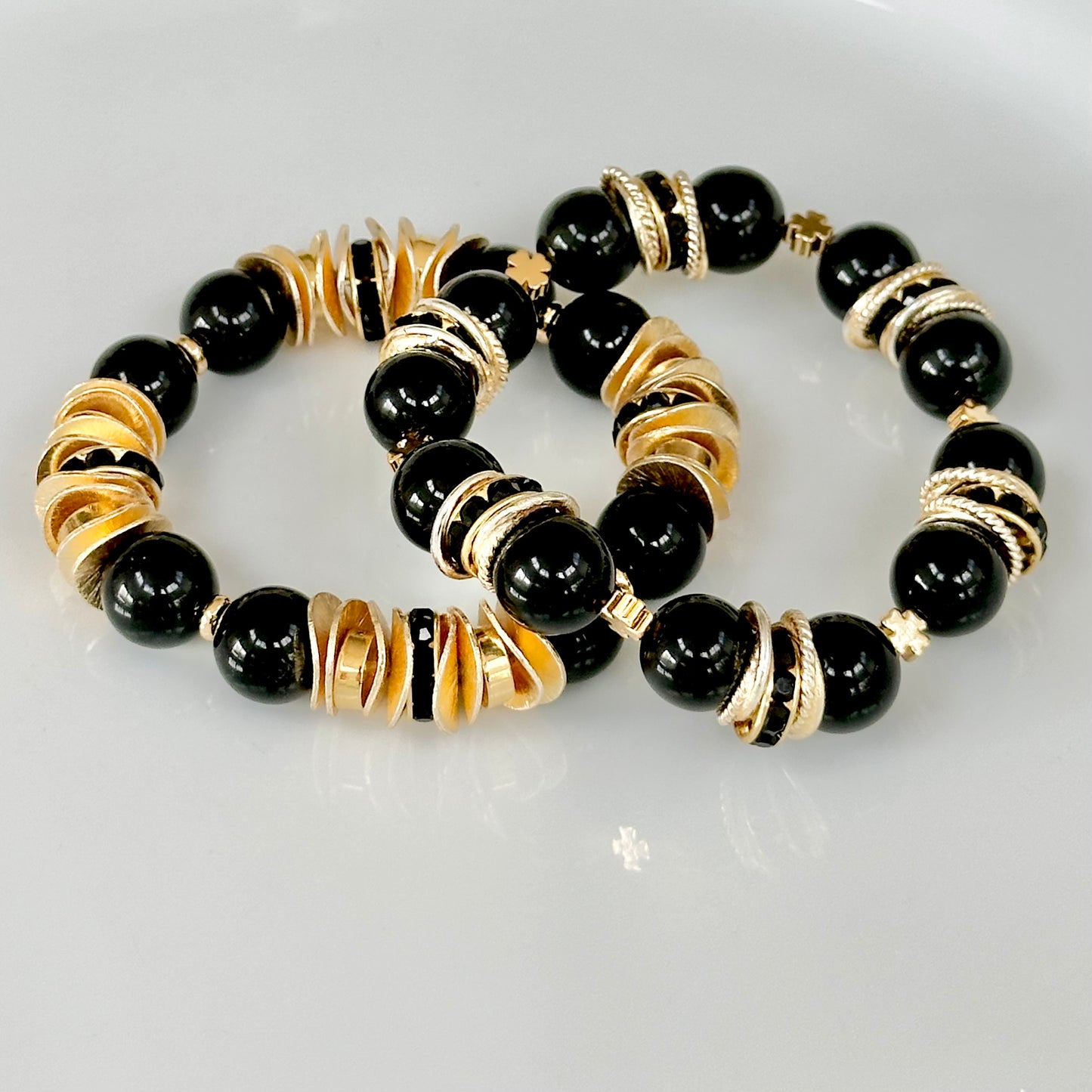 BLACK ONYX GEMSTONE BANGLE WITH GOLD WAVY DISC SND CRYSTAL ACCENTS
