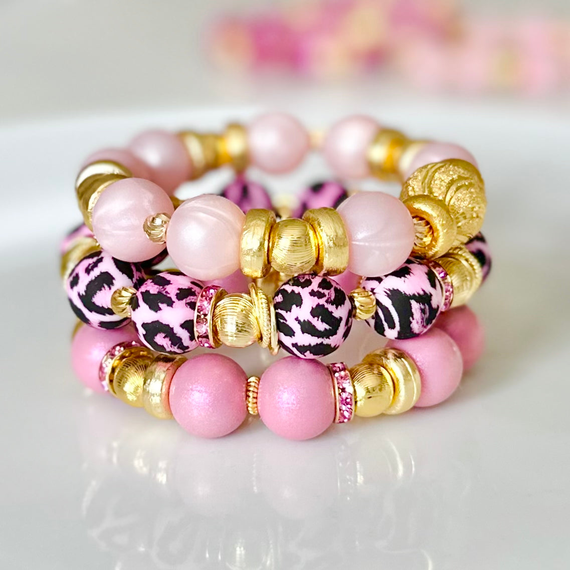 PINK AND BLACK CHEETAH BANGLE WITH GOLD ACCENTS