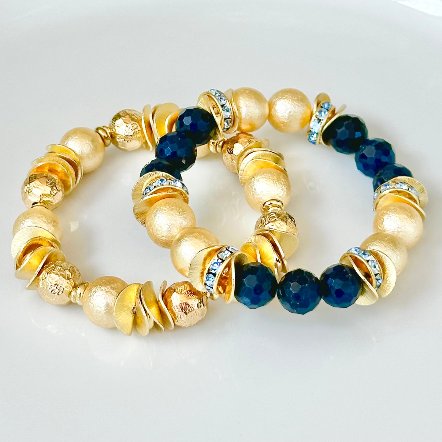 NAVY BLUE FACETED GEMSTONE, GOLD WAVY DISC BANGLE WITH GOLD AND CRYSTAL ACCENTS