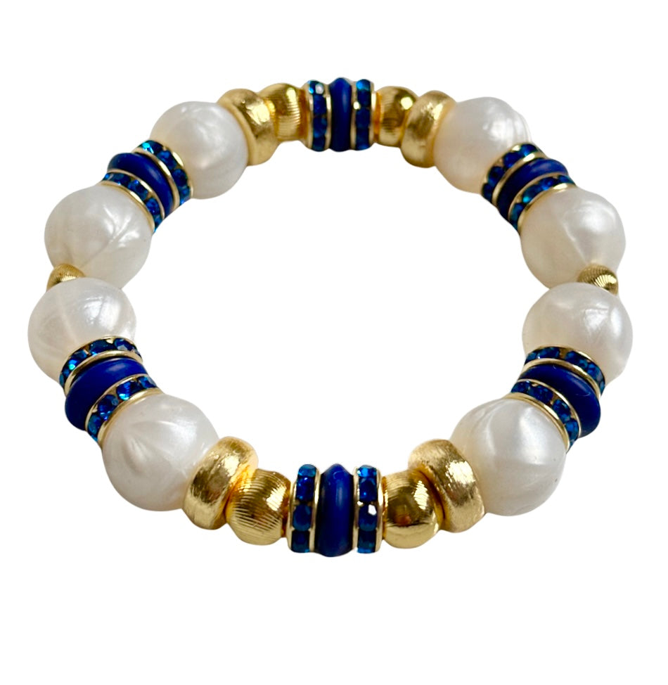 PEARLIZED IVORY BANGLE WITH DARK BLUE AND CZ ACCENTS