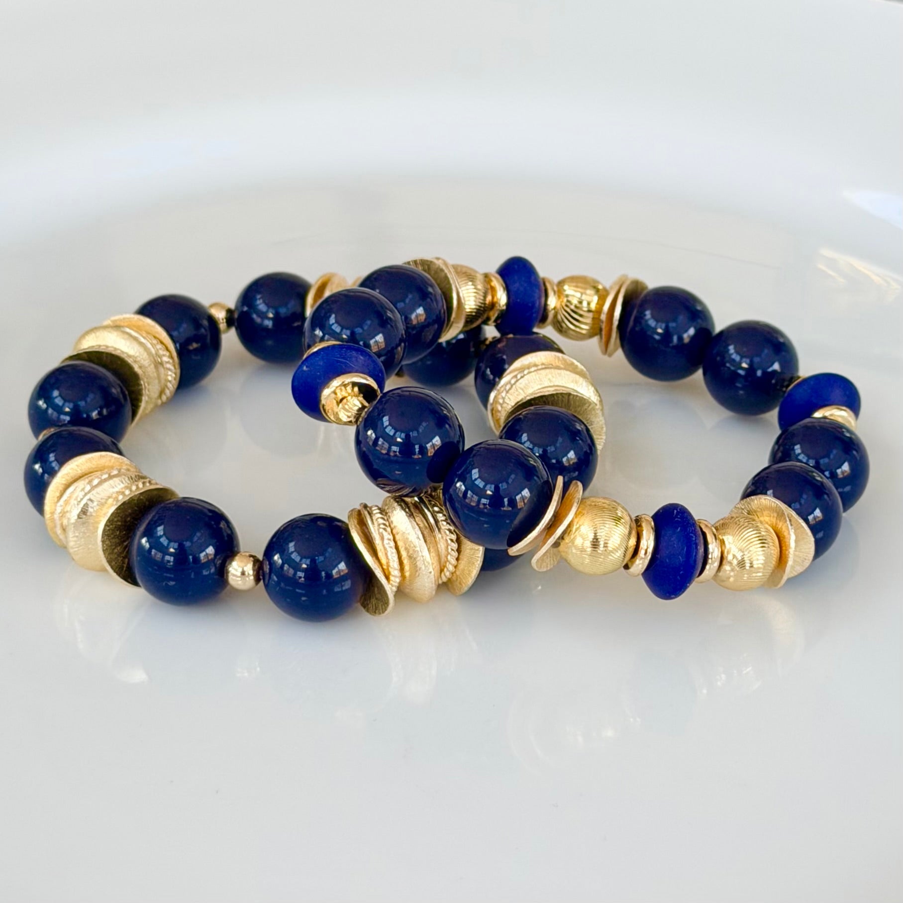 NAVY BLUE BANGLE WITH GOLD WAVY DISC AND NAVY ACCENTS – brynn hudson
