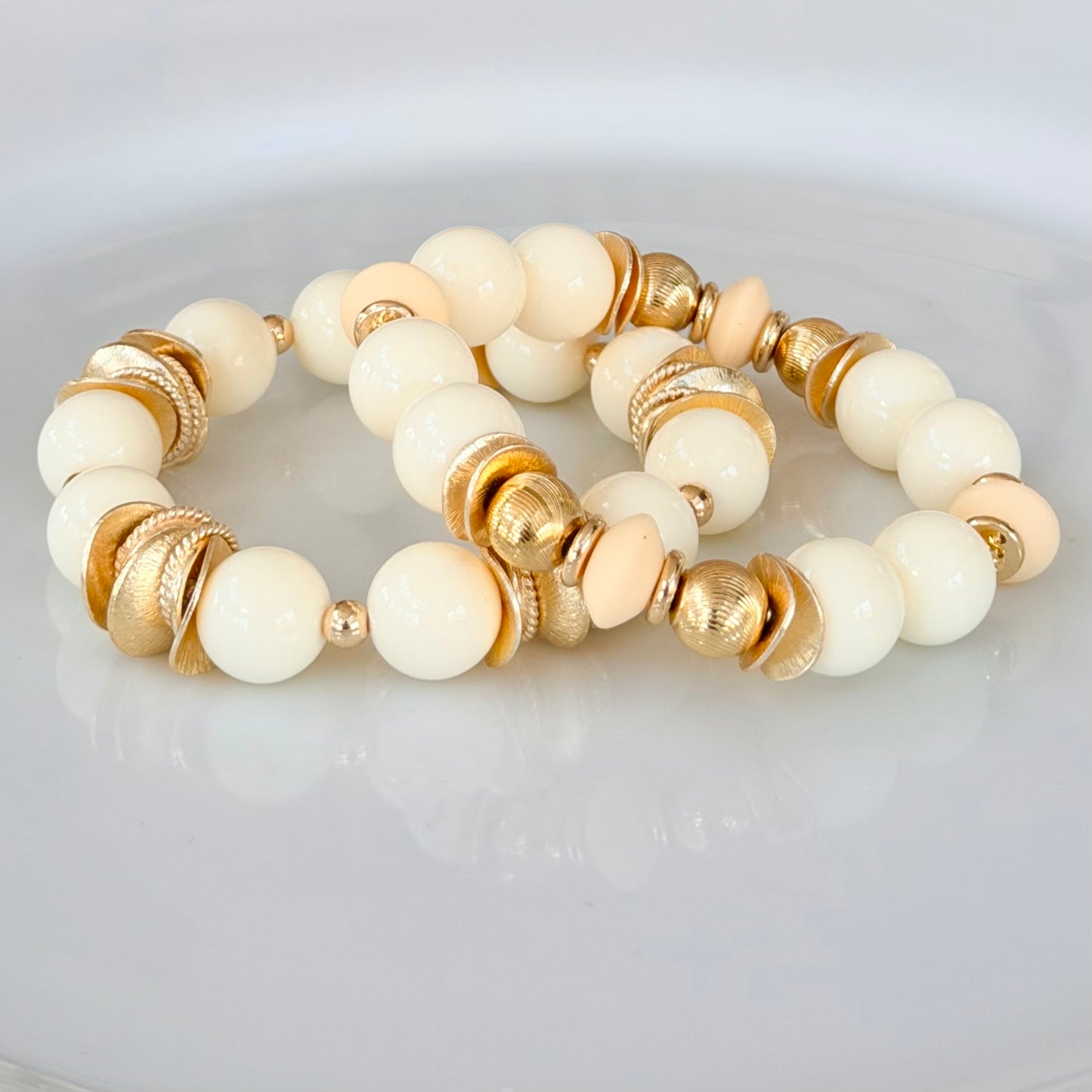 IVORY AND GOLD WAVY DISC BANGLE WITH IVORY AND GOLD ACCENTS