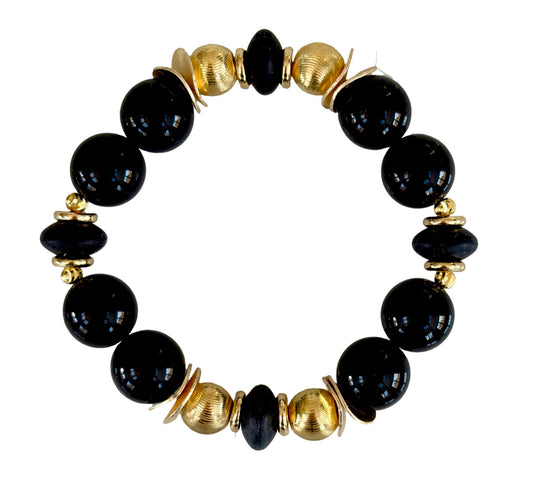 BLACK AND GOLD WAVY DISC BANGLE WOTH GOLD AND BLACK ACCENTS