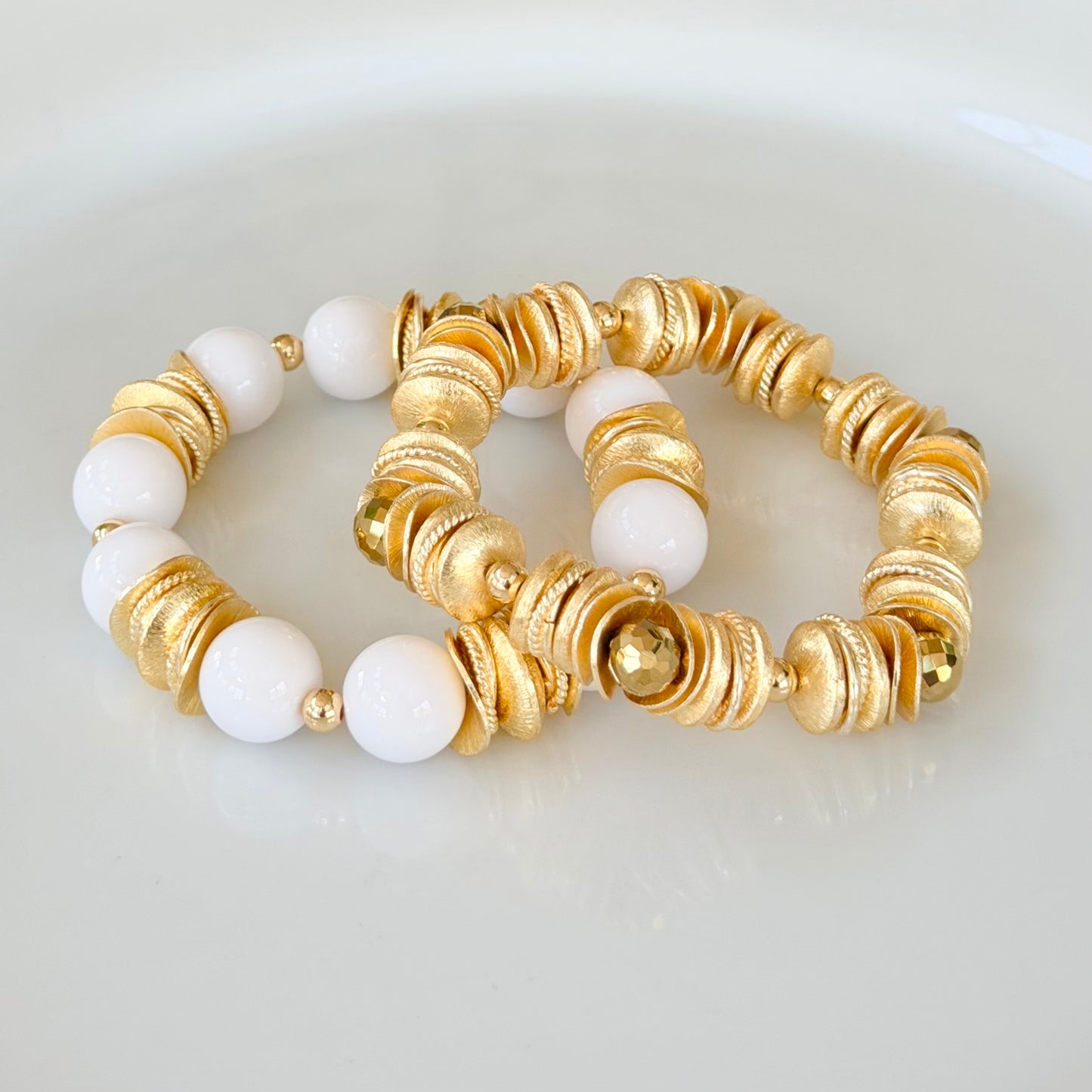 GOLD WAVY DISC BANGLE WITH FACETED GOLD BRIOLETTE ACCENTS