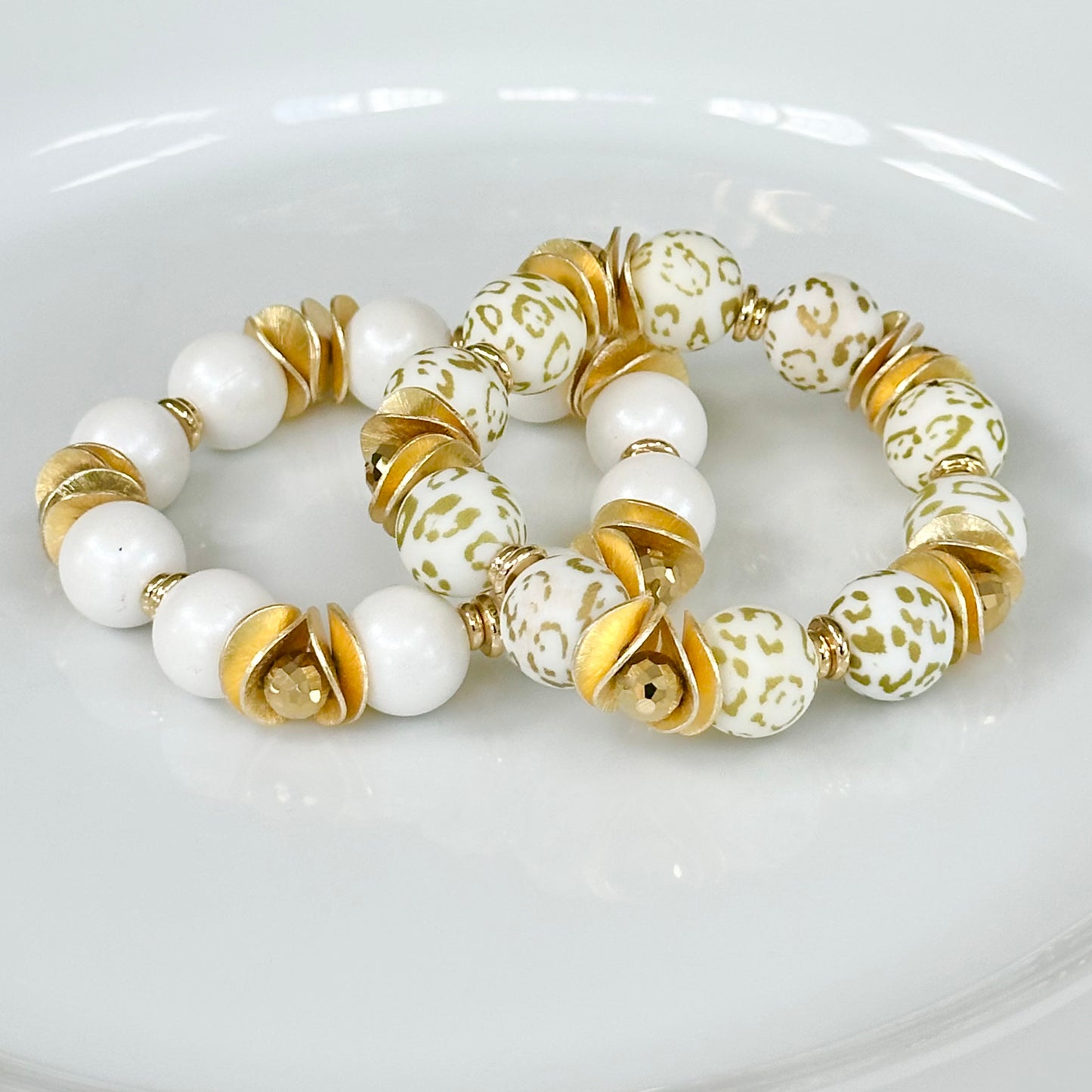 OPALIZED WHITE BANGLE WITH GOLD WAVY DISC AND CRYSTAL ACCENTS