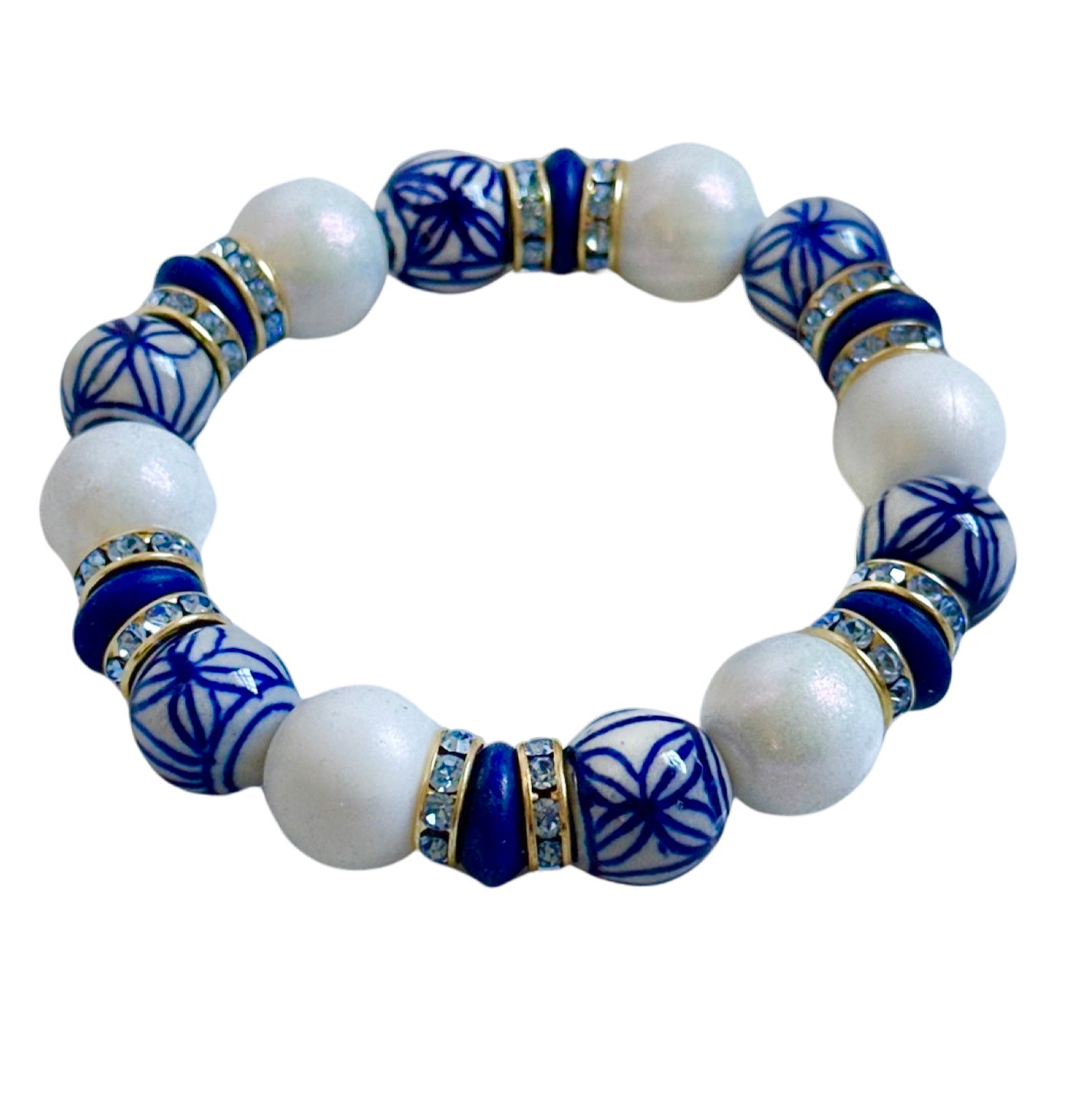 PORCELAIN AND OPALIZED WHITE BANGLE WITH WHITE AND BLUE CZ ACCENTS