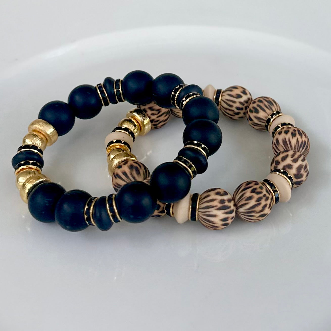BLACK BANGLE WITH GOLD AND BLACK CZ ACCENTS