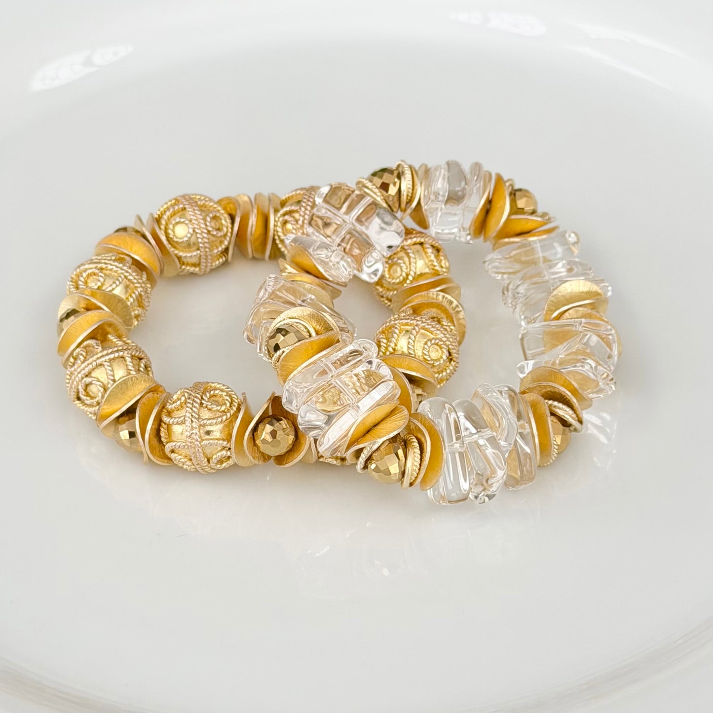GOLD FILAGREE BANGLE WITH WAVY DISC AND FACETED GOLD BRIOLETTE ACCENTS