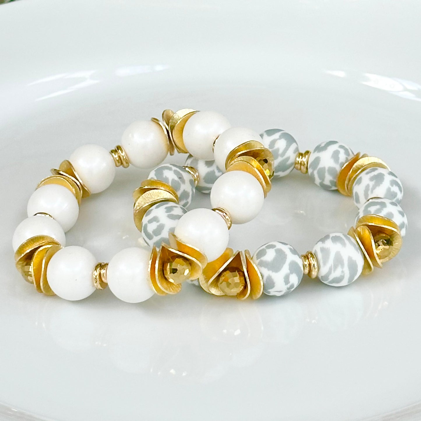 GRAY AND WHITE CHEETAH BANGLE WITH GOLD WAVY DISC AND CRYSTAL ACCENTS