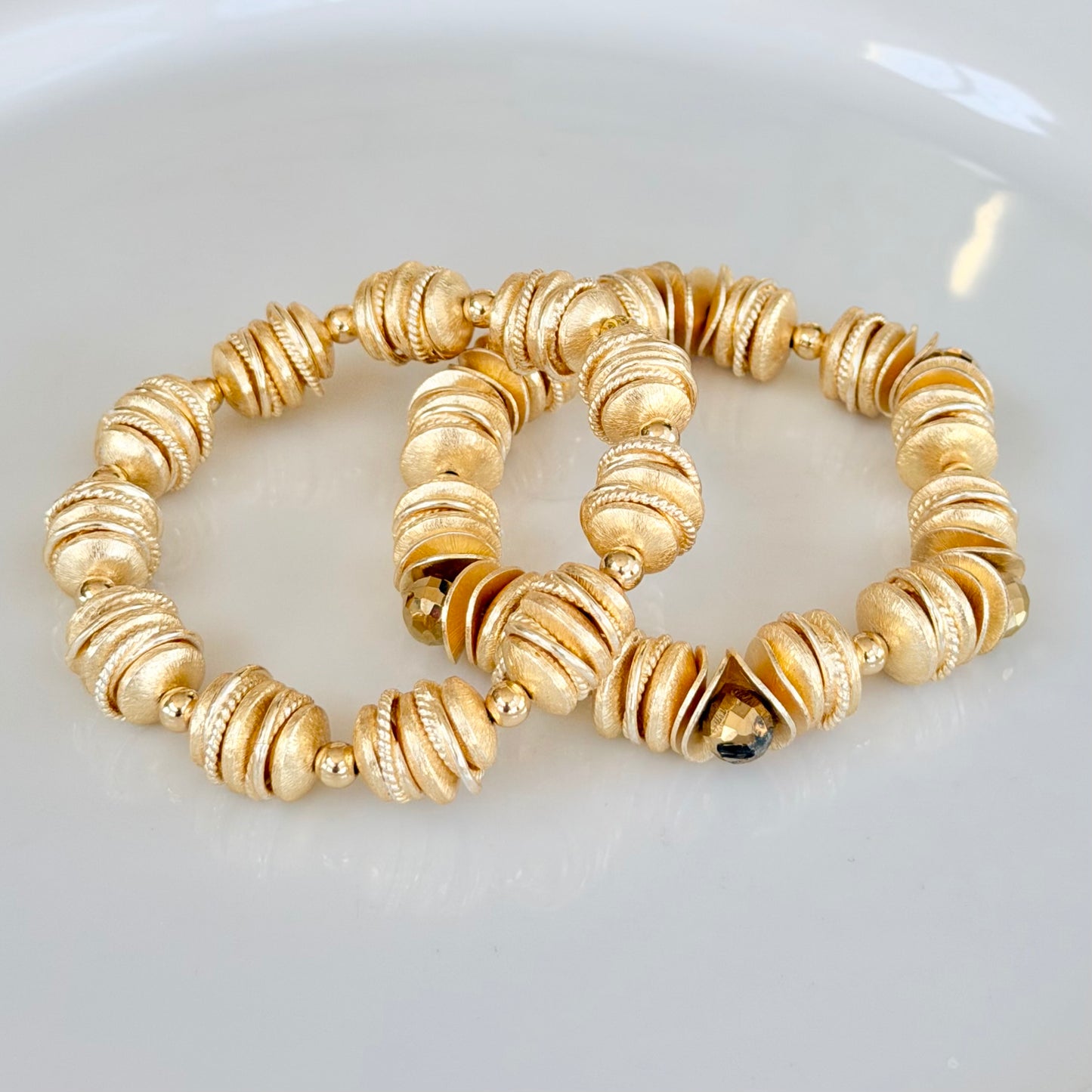 GOLD WAVY DISC BANGLE WITH FACETED GOLD BRIOLETTE ACCENTS