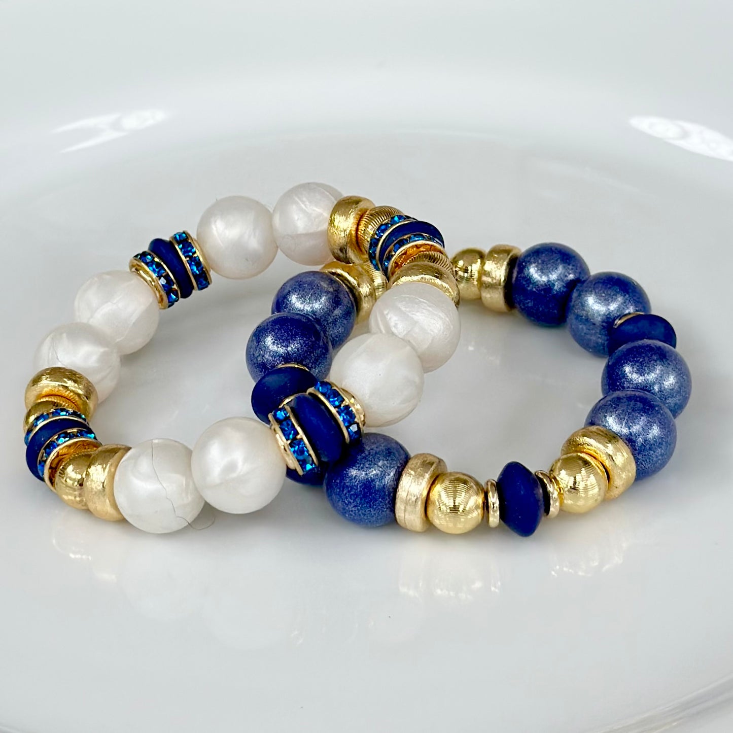 PEARLIZED IVORY BANGLE WITH DARK BLUE AND CZ ACCENTS