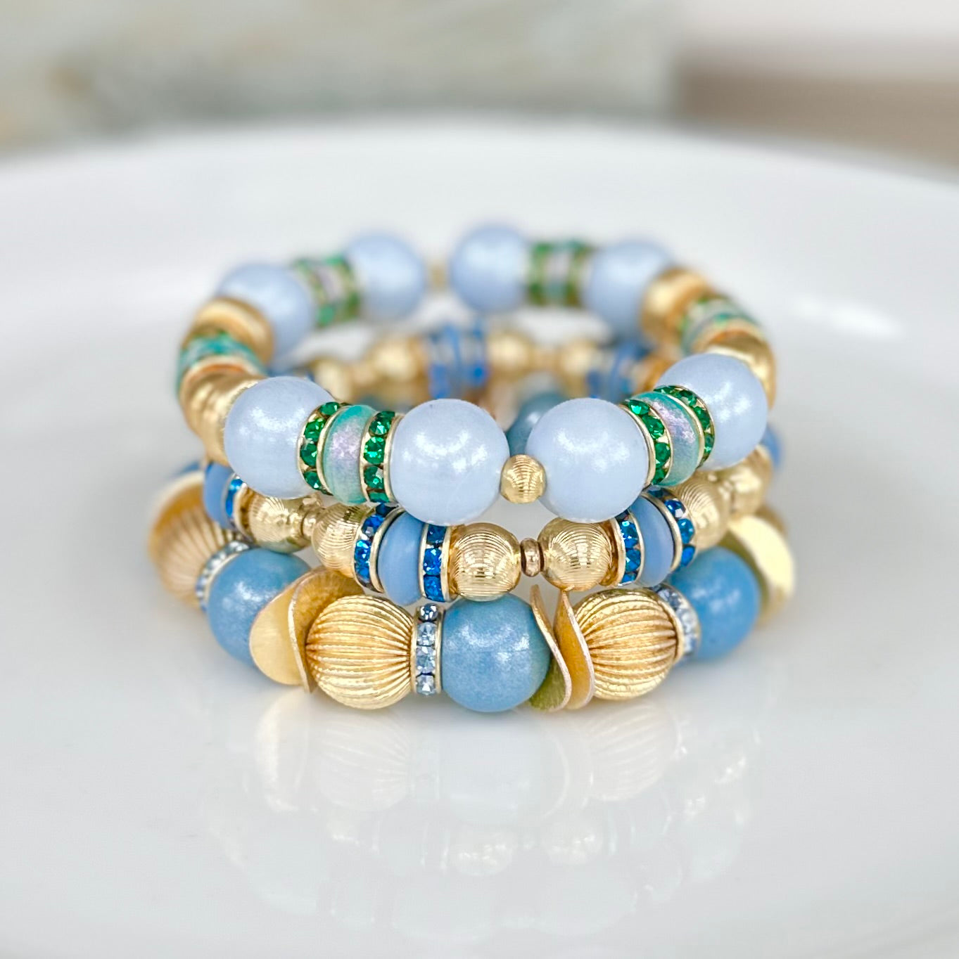 OPALIZED LIGHT BLUE BANGLE WITH GOLD, GREEN AND CZ ACCENTS