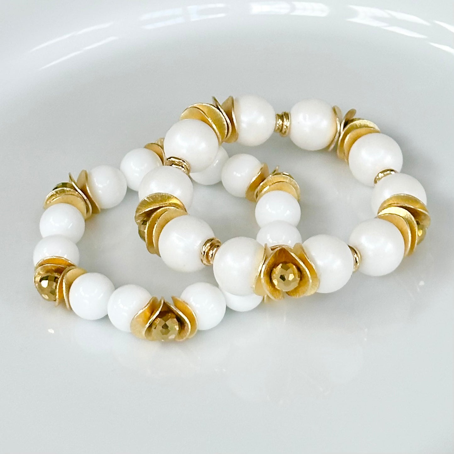 OPALIZED WHITE BANGLE WITH GOLD WAVY DISC AND CRYSTAL ACCENTS