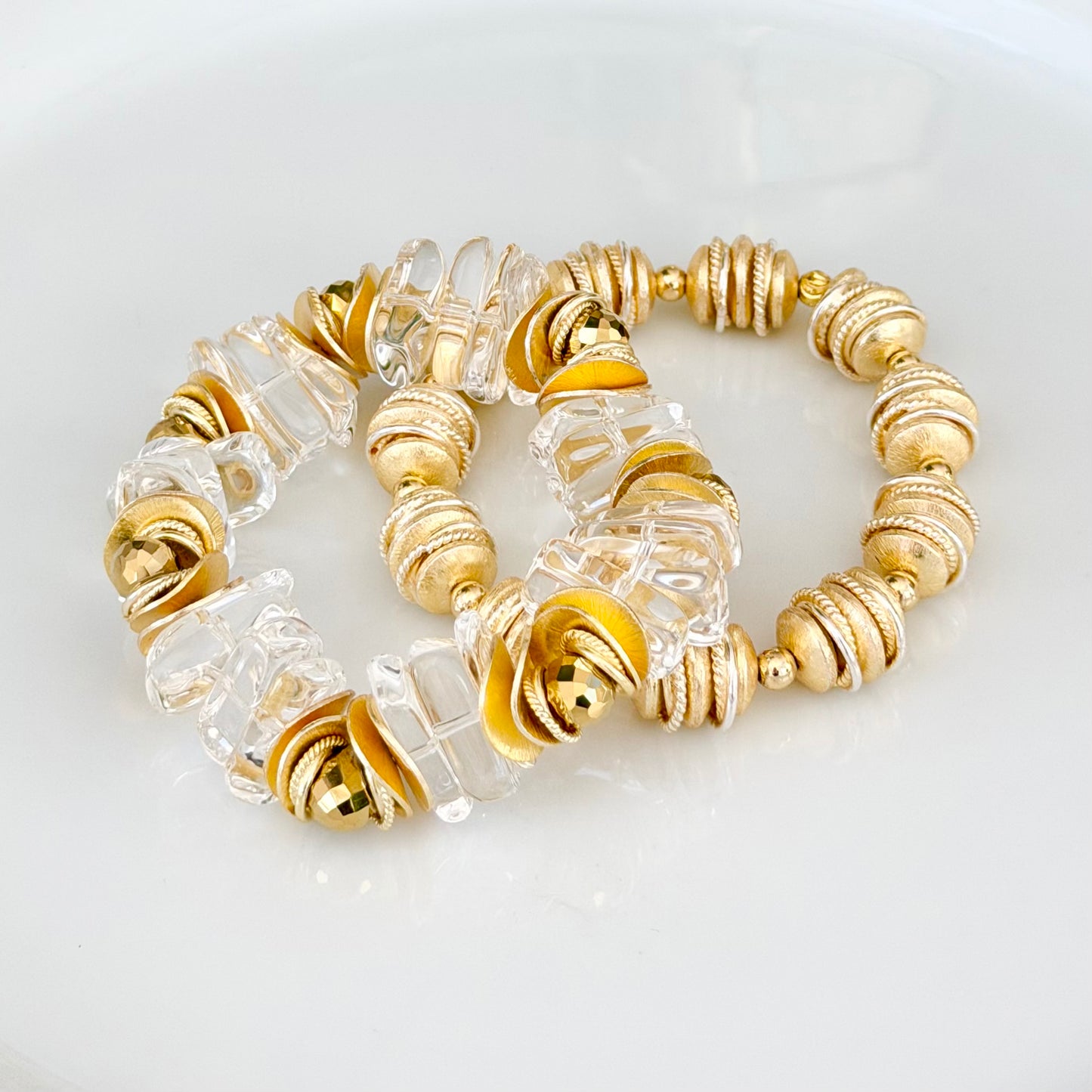 LUCITE BANGLE WITH GOLD TEARDROP AND WAVY DISC ACCENTS