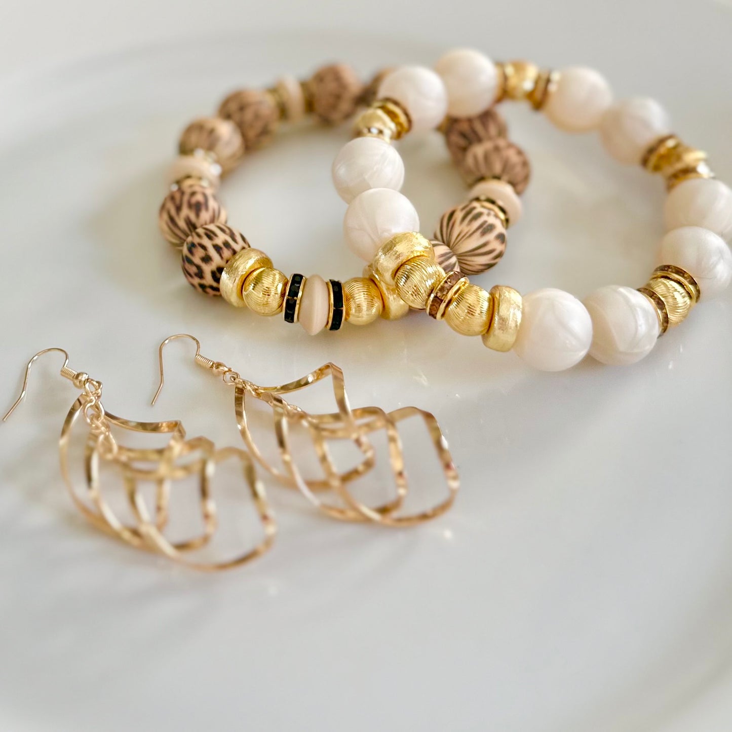 TRIPLE FIGURE EIGHT GOLD EARRING
