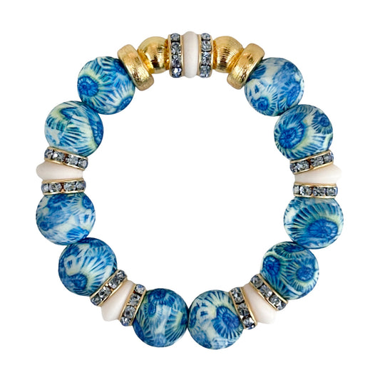 BLUE SEASHELL BANGLE WITH BLUE CZ ACCENTS