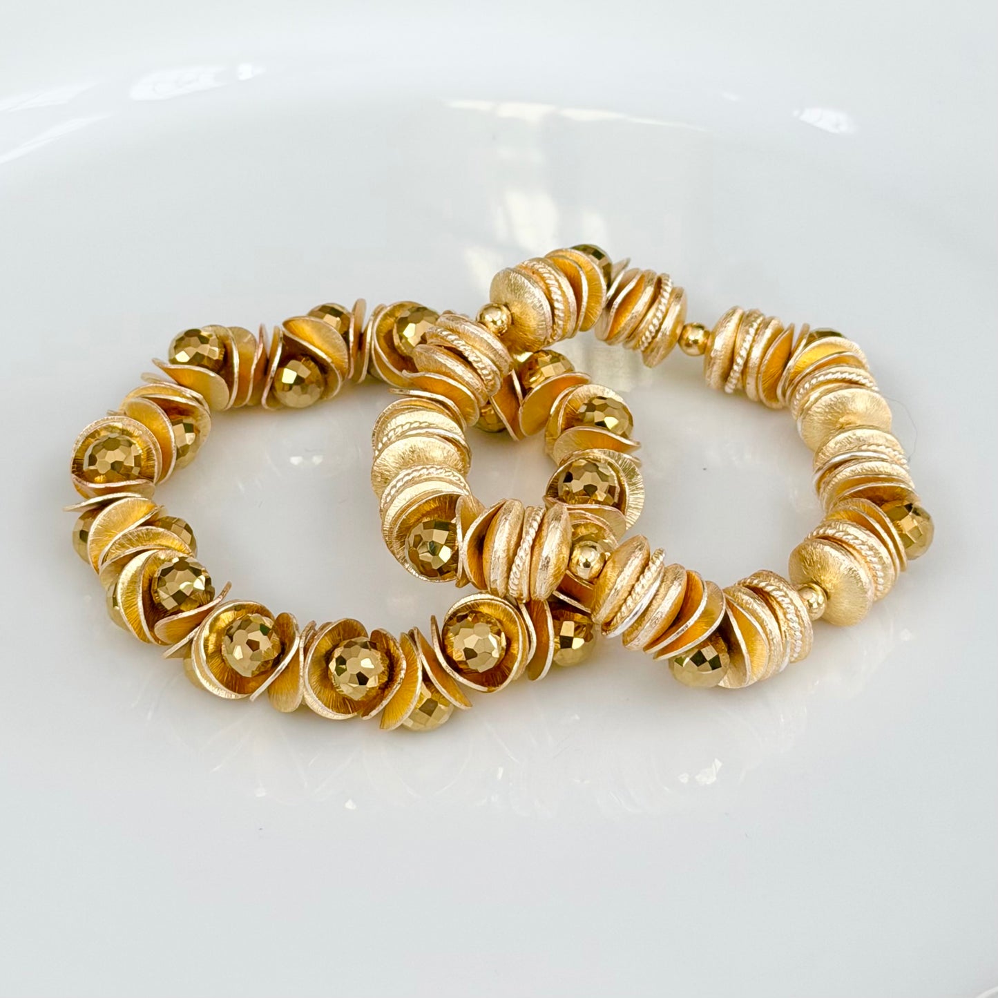 GOLD WAVY DISC AND GOLD FACETED BRIOLETTE BANGLE