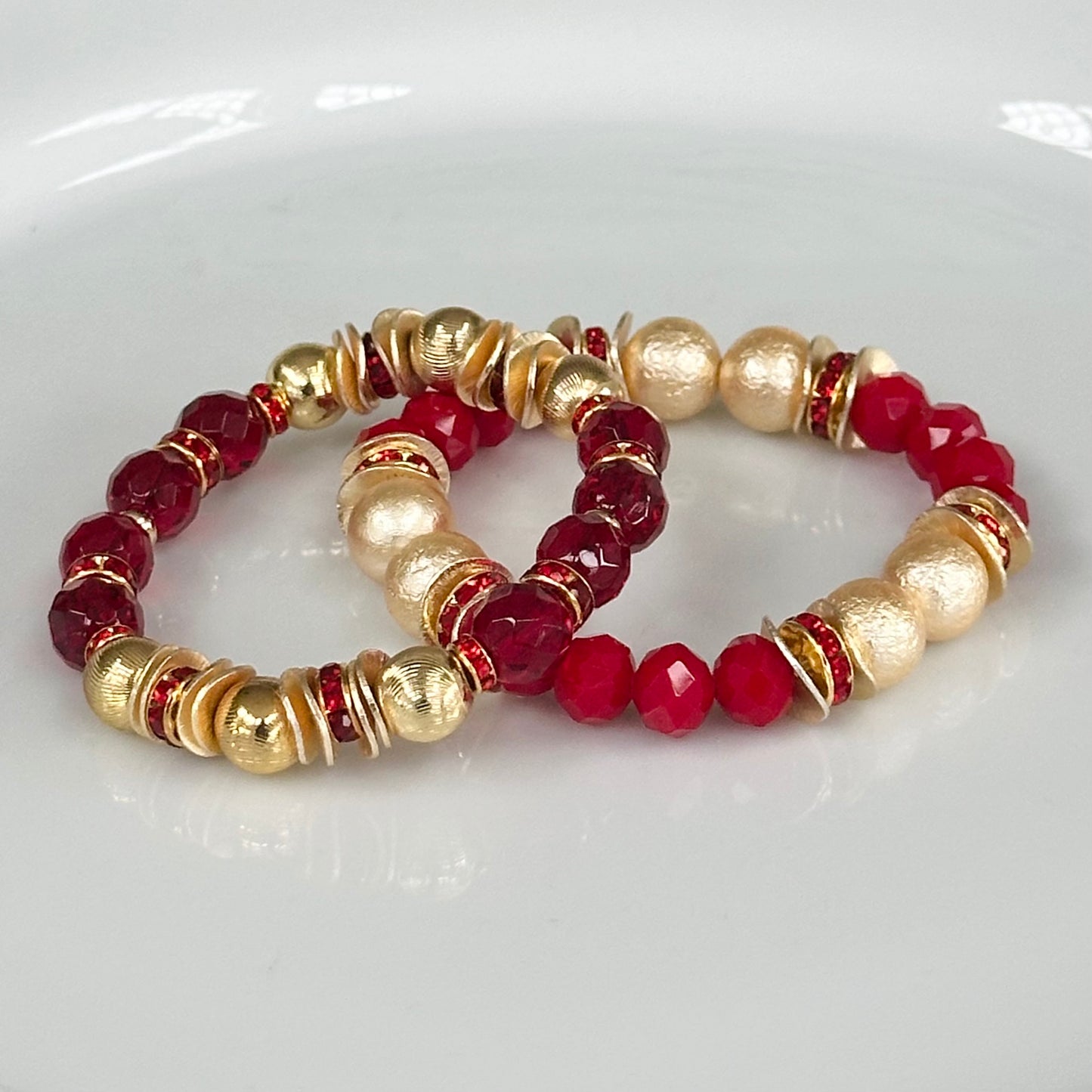 RED FACETED BEADED BANGLE WITH GOLD AND CRYSTAL ACCENTS
