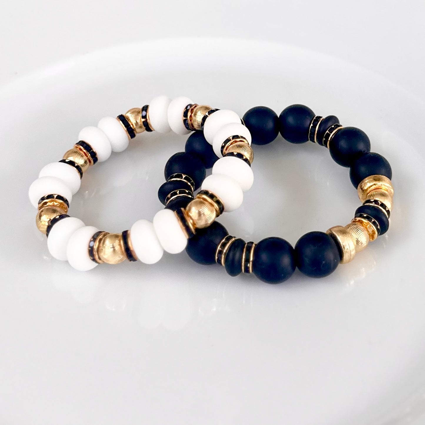 BLACK BANGLE WITH GOLD AND BLACK CZ ACCENTS
