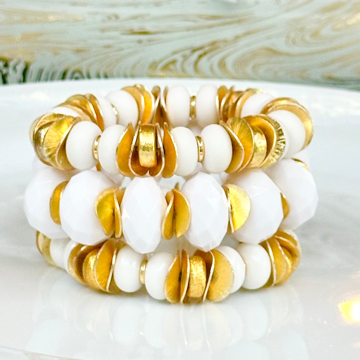 FACETED WHITE AND GOLD STATEMENT BRACELET