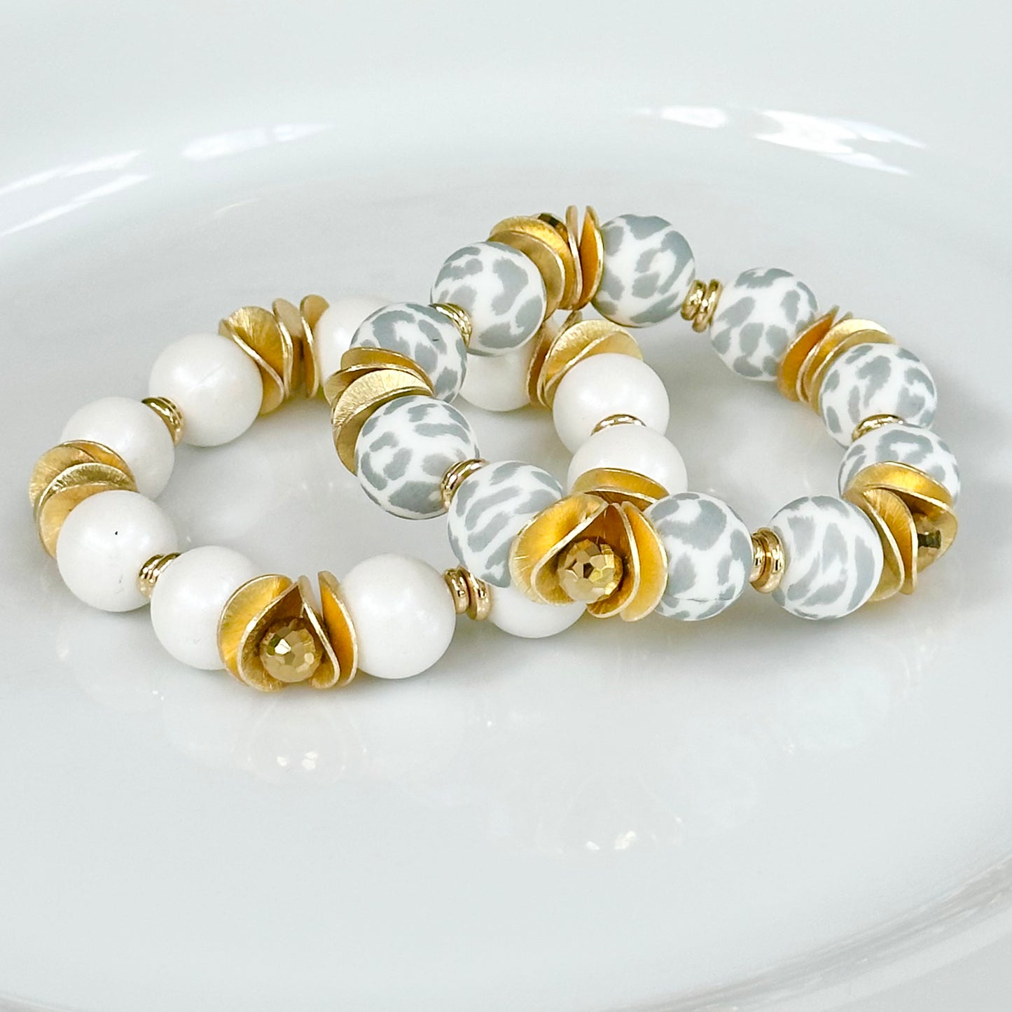 GRAY AND WHITE CHEETAH BANGLE WITH GOLD WAVY DISC AND CRYSTAL ACCENTS