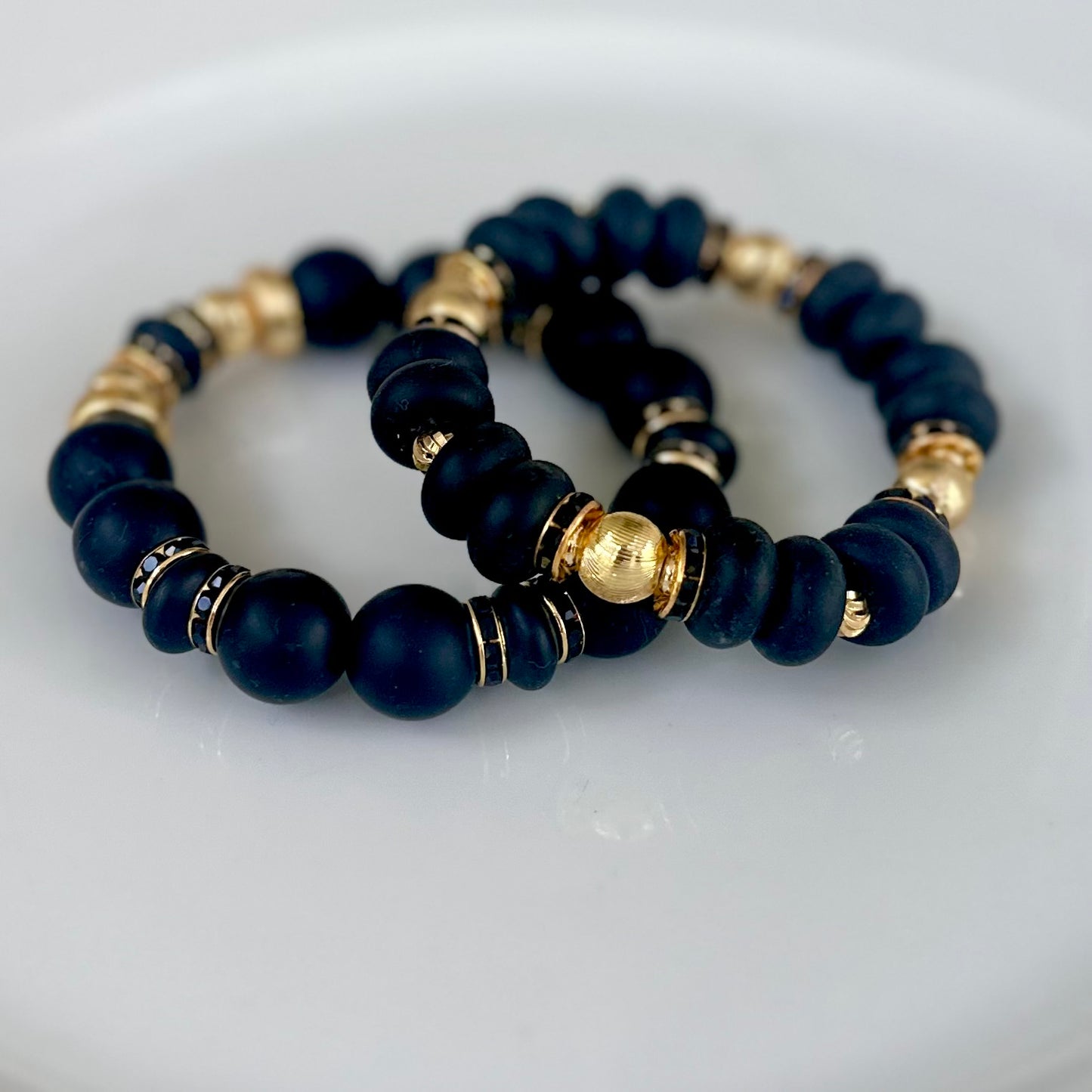 BLACK BANGLE WITH GOLD AND BLACK CZ ACCENTS