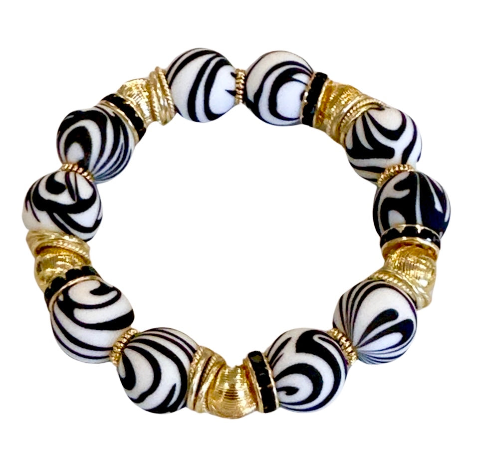 BLACK AND WHITE ZEBRA BANGLE WITH GOLD ACCENTS