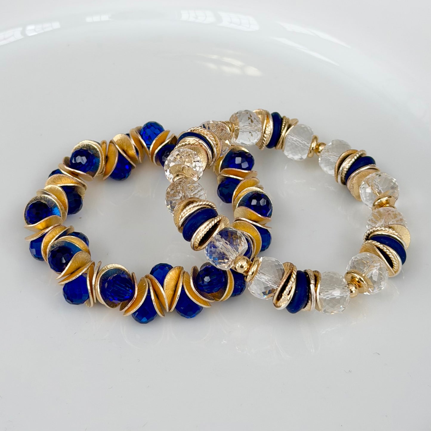 GOLD WAVY DISC AND BLUE FACETED BRIOLETTE BANGLE