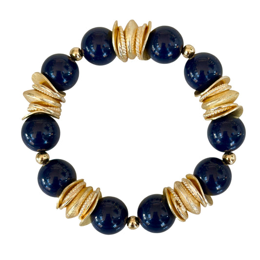 NAVY BLUE BANGLE WITH BRUSHED GOLD WAVY DISC AND GOLD ACCENTS