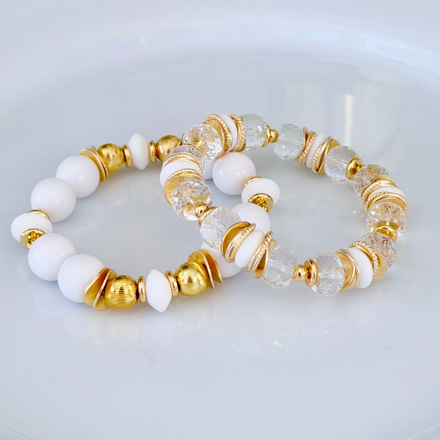 FACETED LUCITE BANGLE WITH GOLD, WAVY DISC AND WHITE ACCENTS