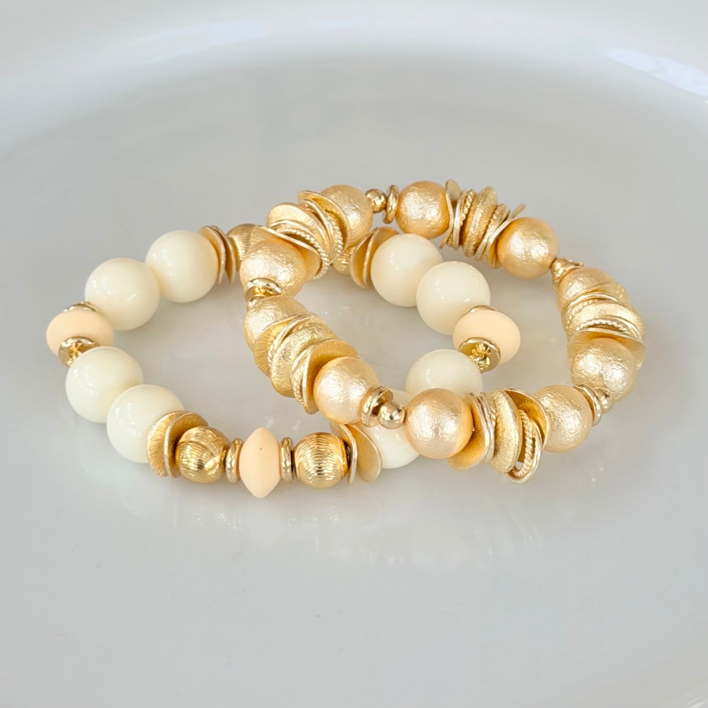IVORY AND GOLD WAVY DISC BANGLE WITH IVORY AND GOLD ACCENTS