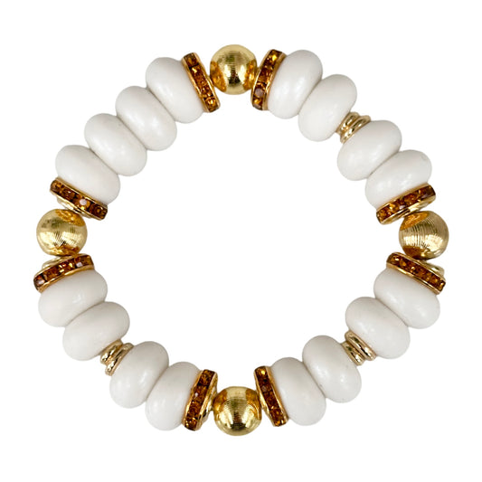 WHITE SPIRAL BANGLE WITH AMBER CZ ACCENTS