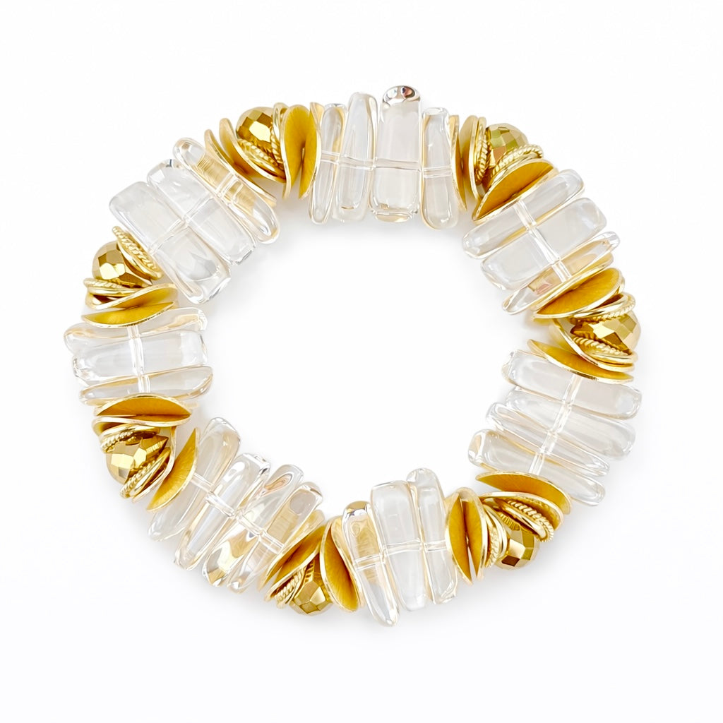 LUCITE BANGLE WITH GOLD TEARDROP AND WAVY DISC ACCENTS