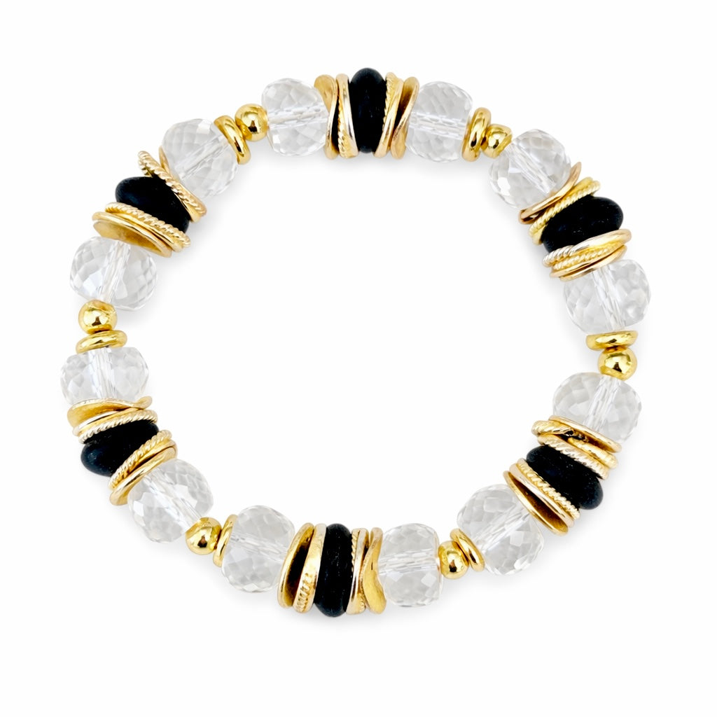 FACETED LUCITE BANGLE WITH GOLD, WAVY DISC AND BLACK ACCENTS
